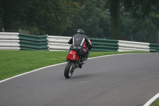 Mike Hose wheelies over the Mountain at Cadwell Park - © Tony Roberts